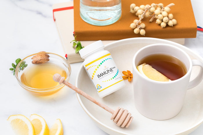 pill bottle, tea and honey