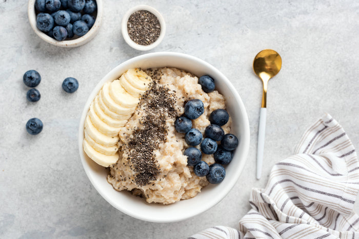 bowl with bananas, blueberries and oatmeal