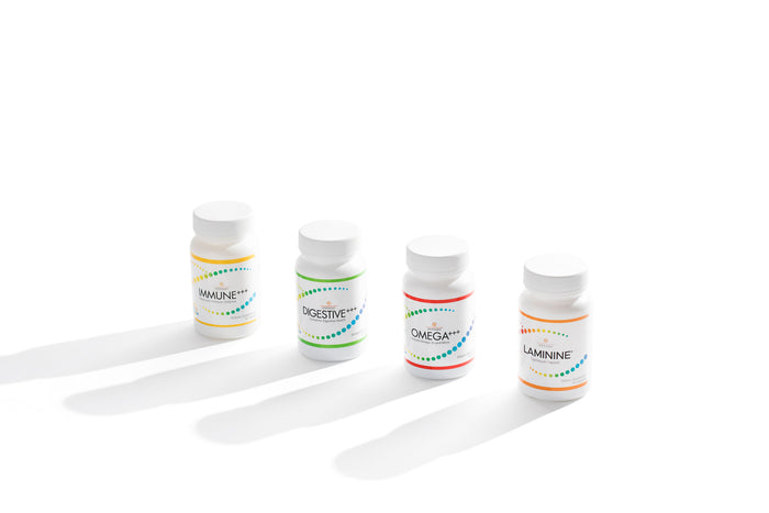 four pill bottles in line