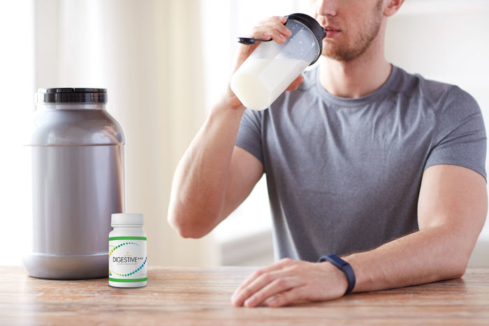 man drinking a protein shake