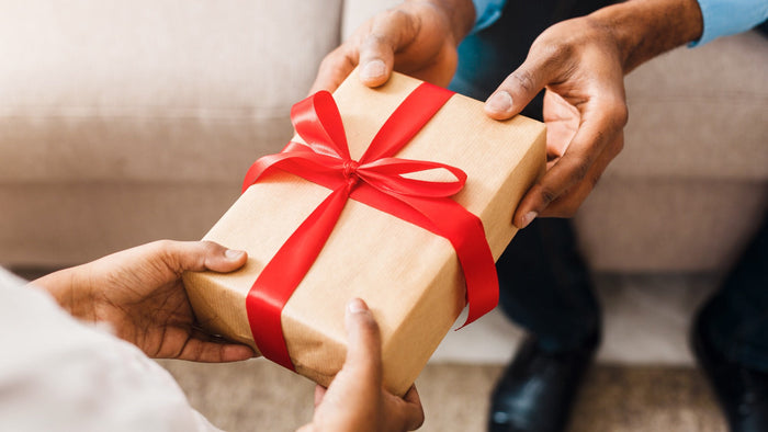 person giving a gift