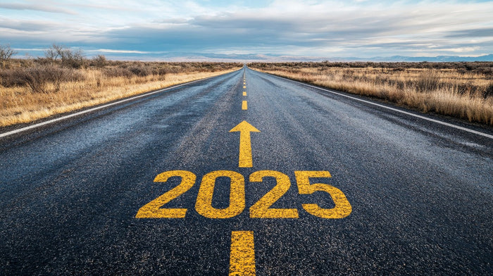 2025 on road with arrow pointing up